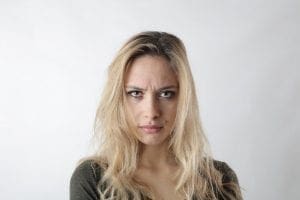 The Top 11 Things Girls Go Through In Their Lives 7 Woman Frowning